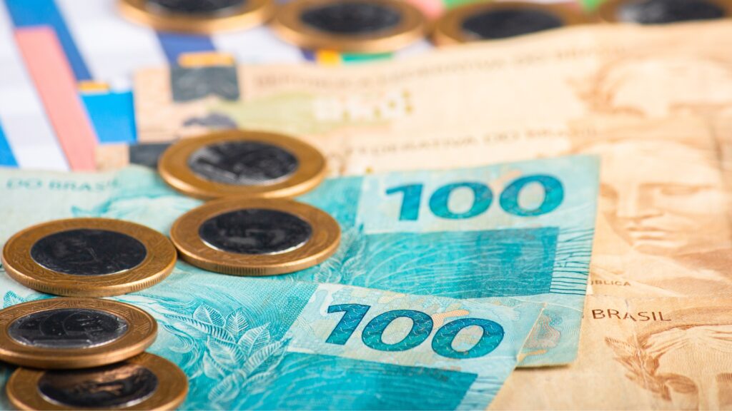 Imposto de Renda (IR) sendo pago após resgate de investimento